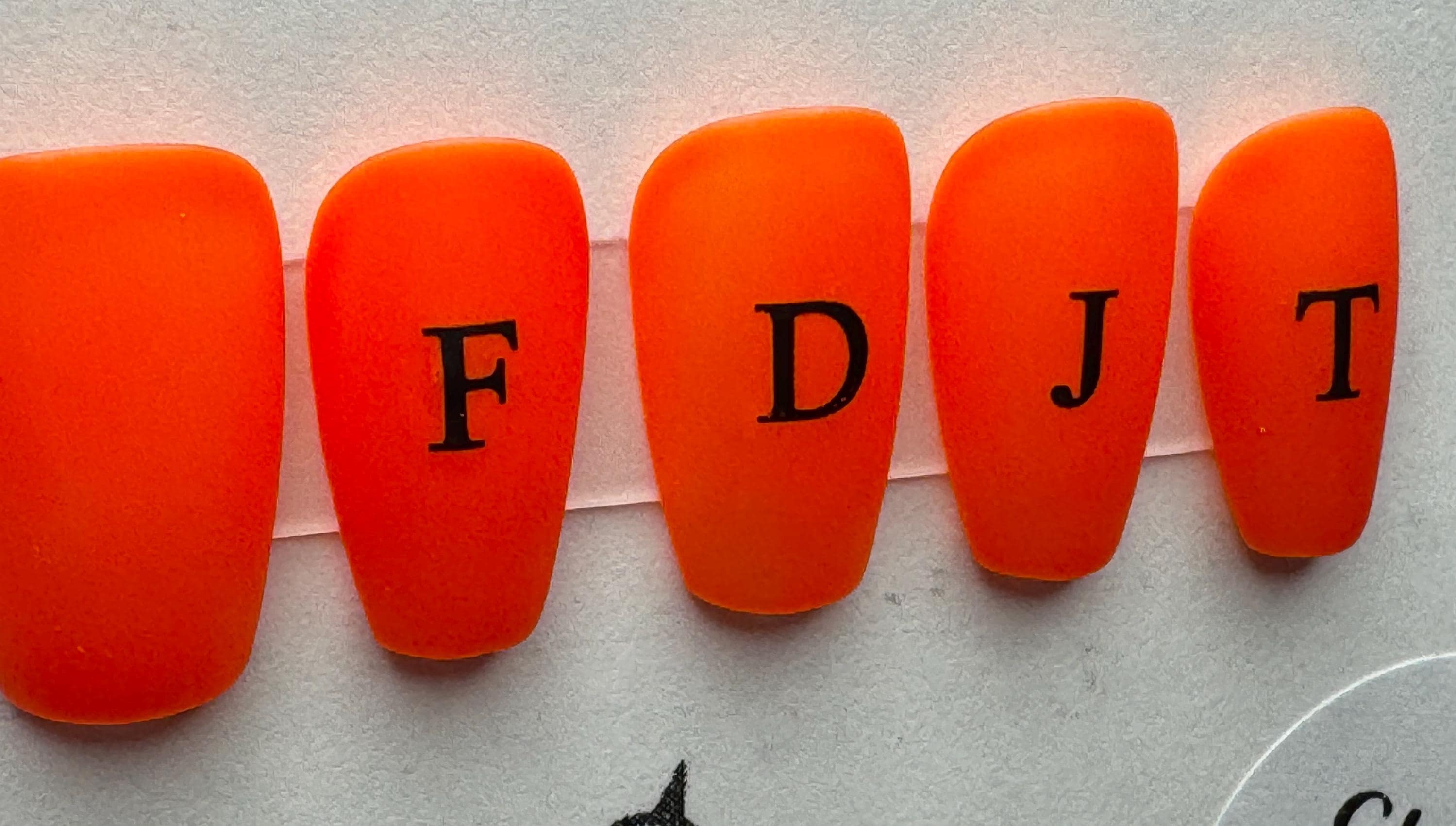 Red FDJT; press-on nails